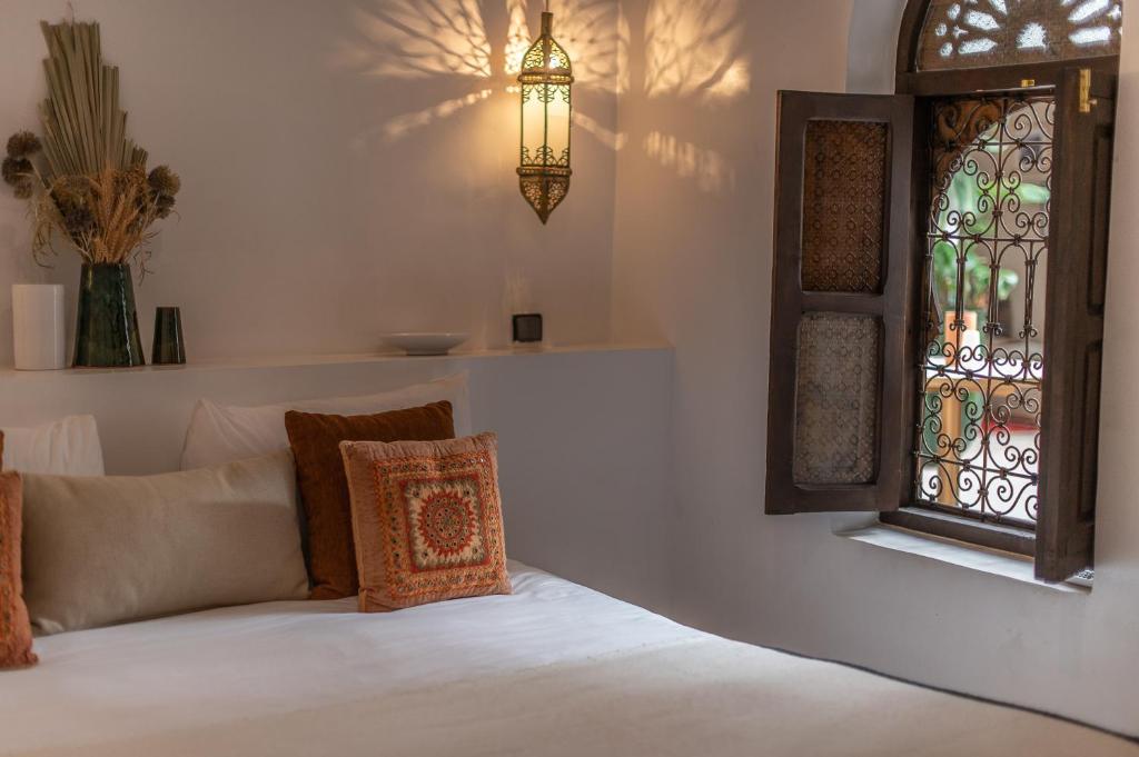 Cama o camas de una habitación en Riad Babouchta & Spa