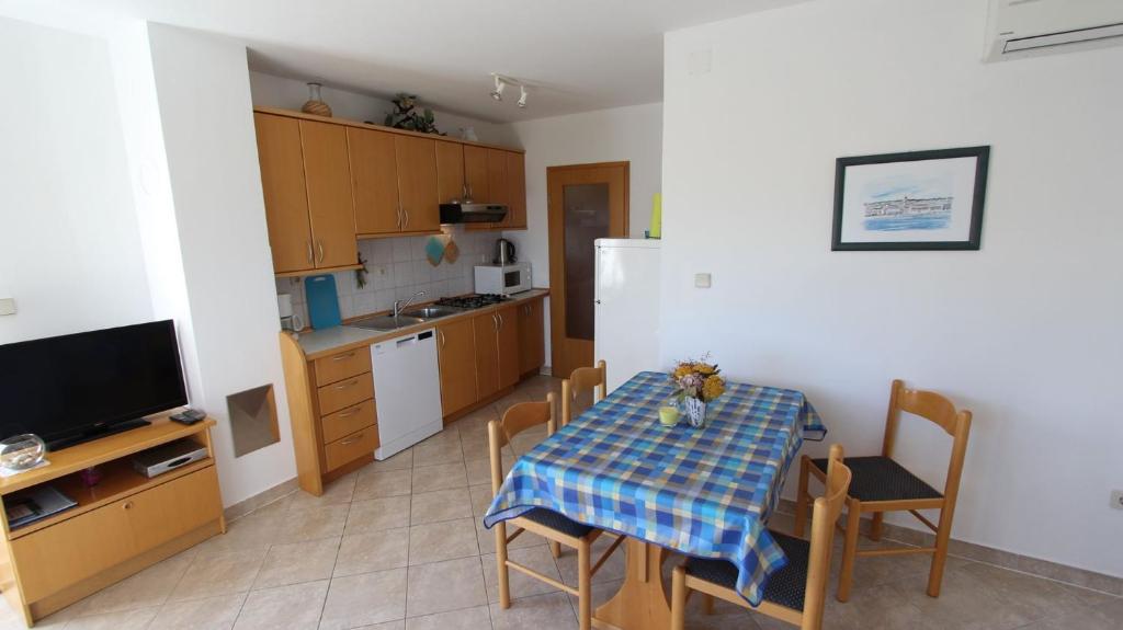Kuchyň nebo kuchyňský kout v ubytování Apartments Damir