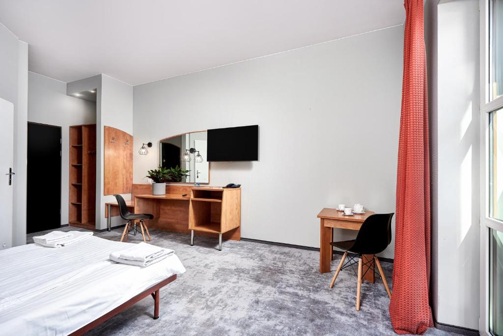 TV a/nebo společenská místnost v ubytování Hotel Anton by DNS