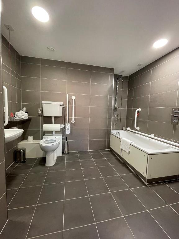 Koupelna v ubytování Hotel Xanadu