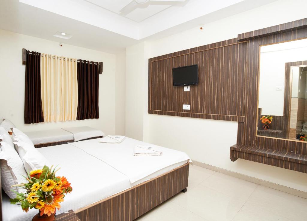 Cama o camas de una habitación en Blueberry Budget Hotel