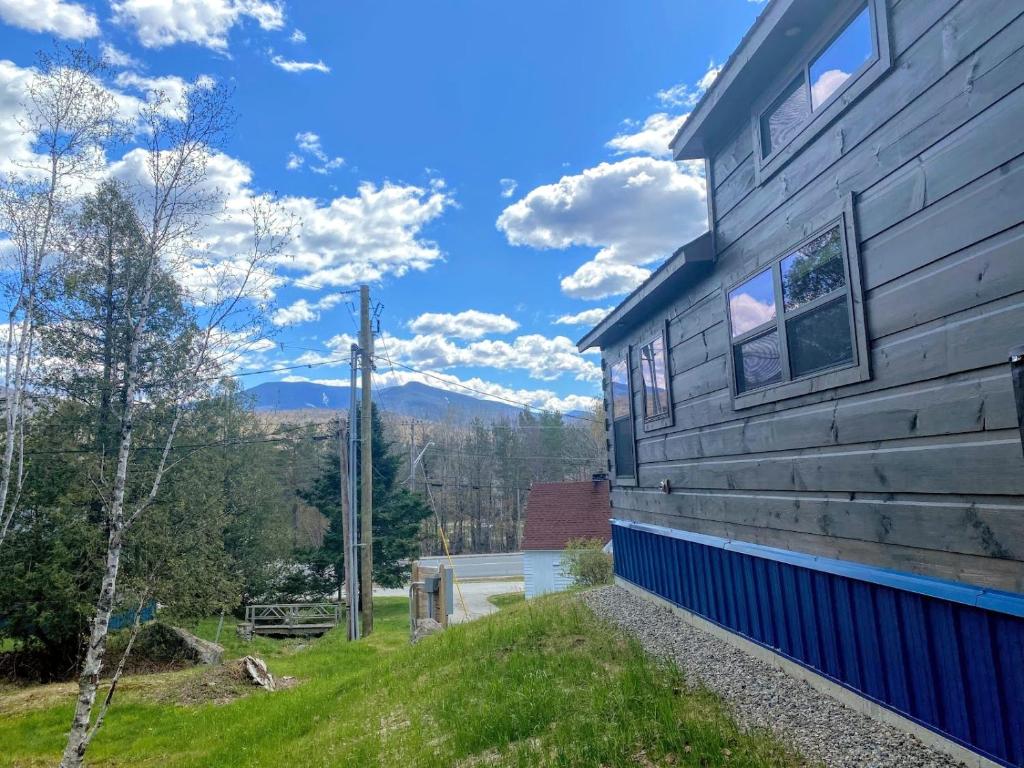 a house with a view of the mountains at B2 NEW Awesome Tiny Home with AC Mountain Views Minutes to Skiing Hiking Attractions in Carroll