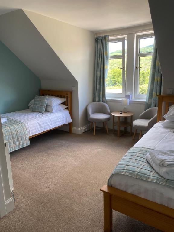 Posteľ alebo postele v izbe v ubytovaní West Loch House