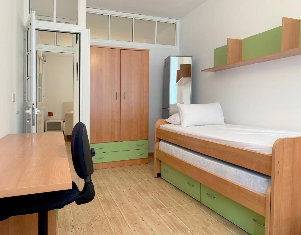 Postel nebo postele na pokoji v ubytování Beach Apartment