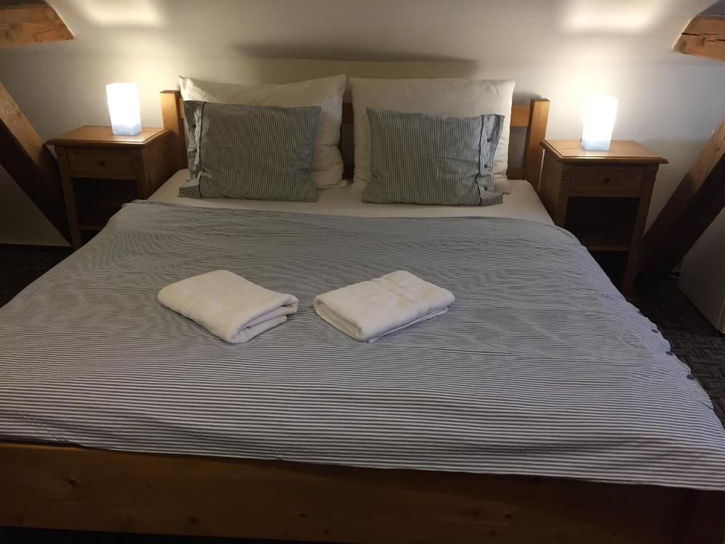 Postel nebo postele na pokoji v ubytování Apartmány u Honzy