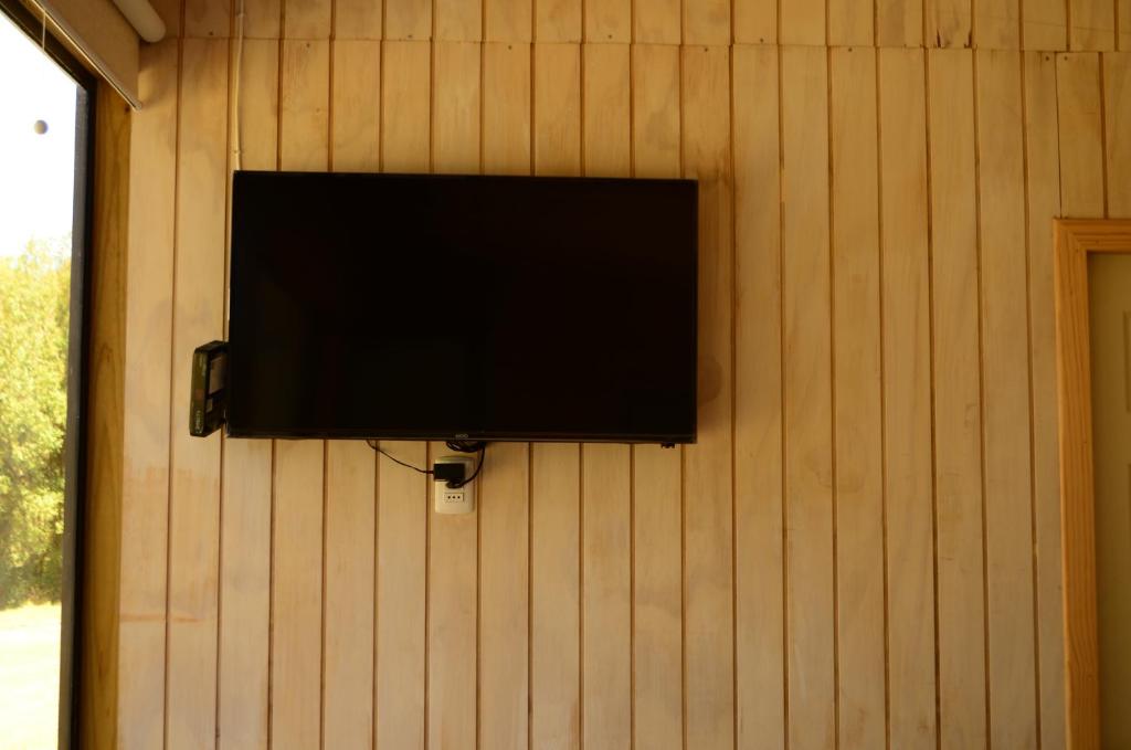 TV a/nebo společenská místnost v ubytování Nativo Lodges