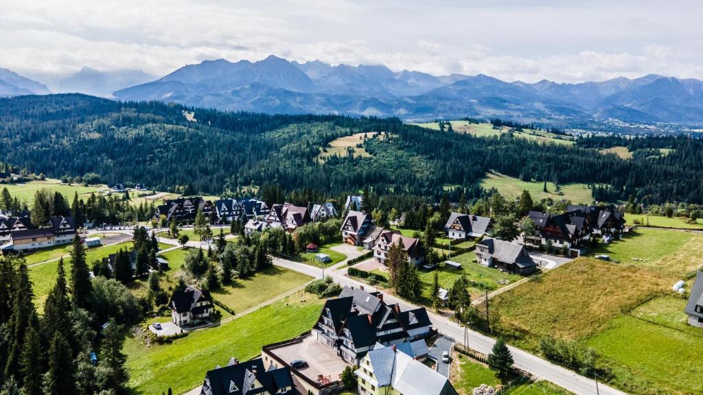 an aerial view of a village in the mountains at Willa na Olczańskim Wierchu in Bukowina Tatrzańska