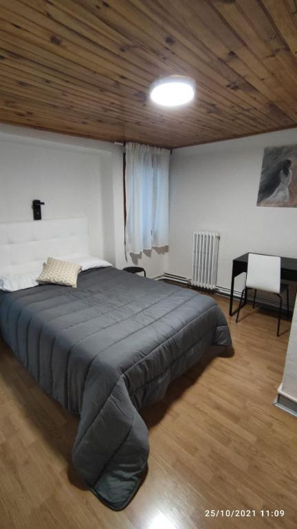 Posteľ alebo postele v izbe v ubytovaní Hostal ARS
