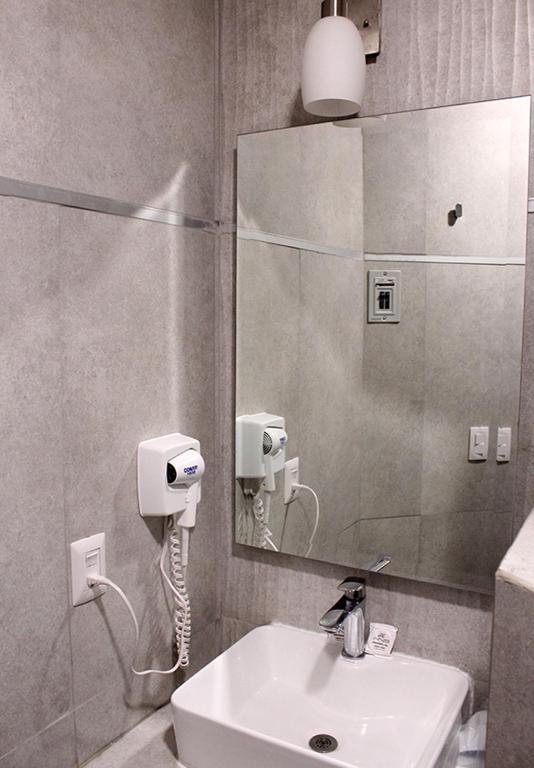 Koupelna v ubytování Hotel ANB Aeropuerto Guadalajara