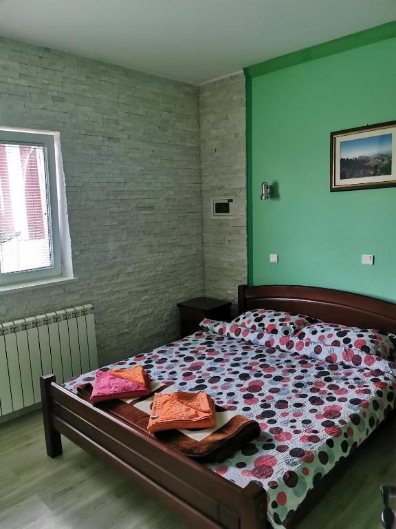 Postel nebo postele na pokoji v ubytování Apartments Razvršje