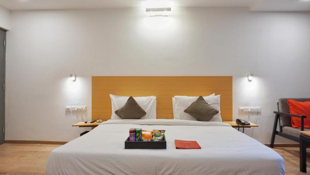 Postel nebo postele na pokoji v ubytování Hotel Maitrayee