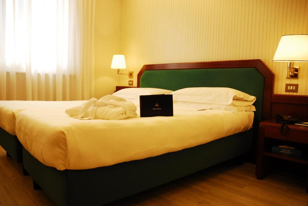 Postel nebo postele na pokoji v ubytování Hotel Astoria Sure Hotel Collection By Best Western