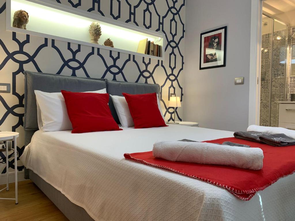Postel nebo postele na pokoji v ubytování Domus Gaudens Luxury Apartment