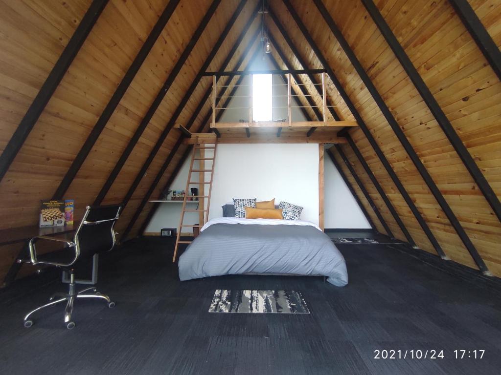 Postel nebo postele na pokoji v ubytování Refugio El Cacique