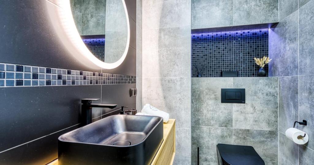 Kúpeľňa v ubytovaní Apartamenty Marilu
