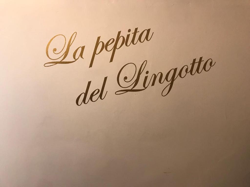 a sign that reads a positano del limpopo at La pepita del Ling8 in Turin