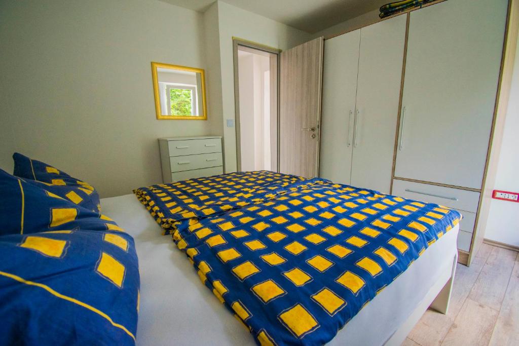 Postel nebo postele na pokoji v ubytování Apartments Relax near Opatija