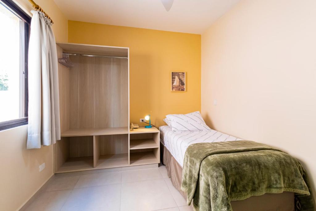 Postel nebo postele na pokoji v ubytování Hospedaria Santo André