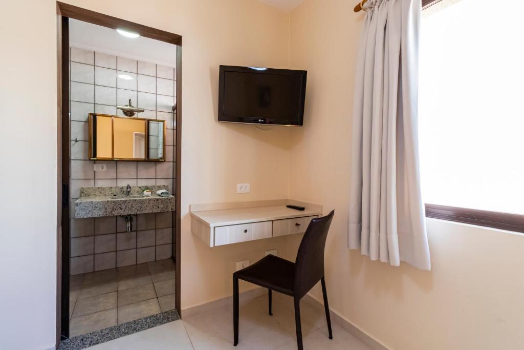 TV a/nebo společenská místnost v ubytování Hospedaria Santo André