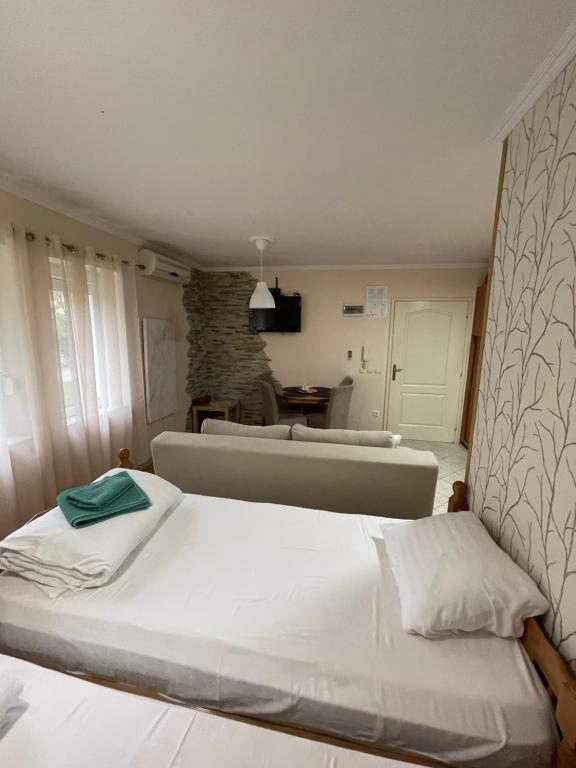 מיטה או מיטות בחדר ב-Apartman Gagi