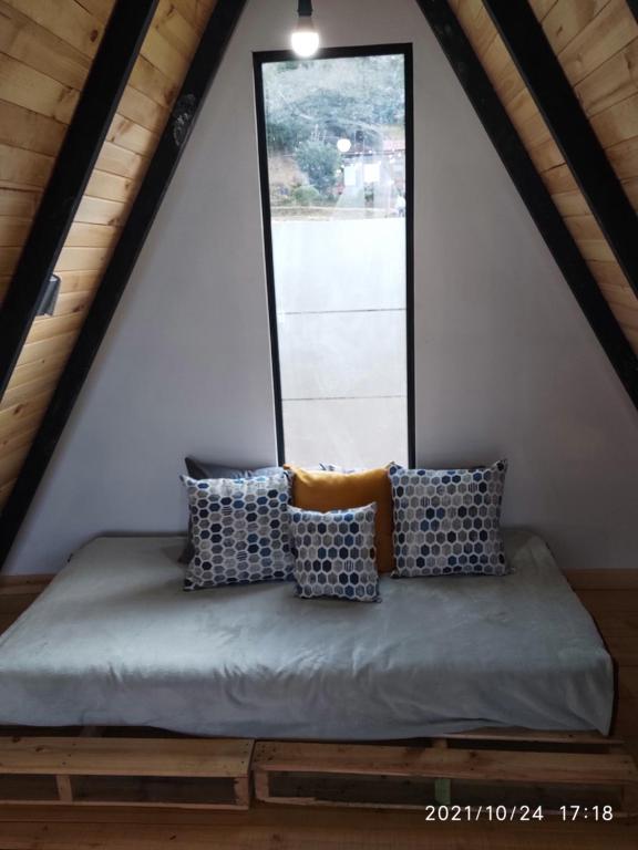 Postel nebo postele na pokoji v ubytování Refugio El Cacique