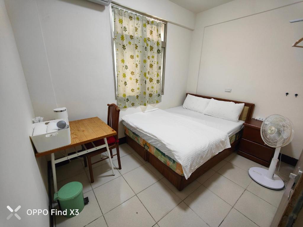 Postel nebo postele na pokoji v ubytování Homestyle Homestay