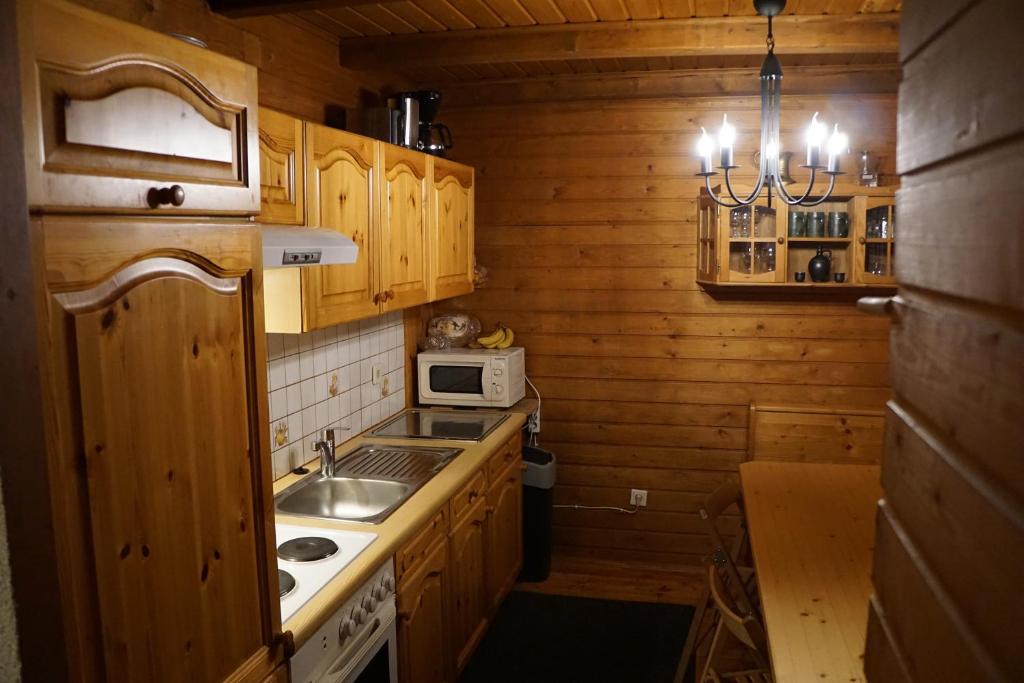 Kuchyň nebo kuchyňský kout v ubytování Gerlitzen-Hütte