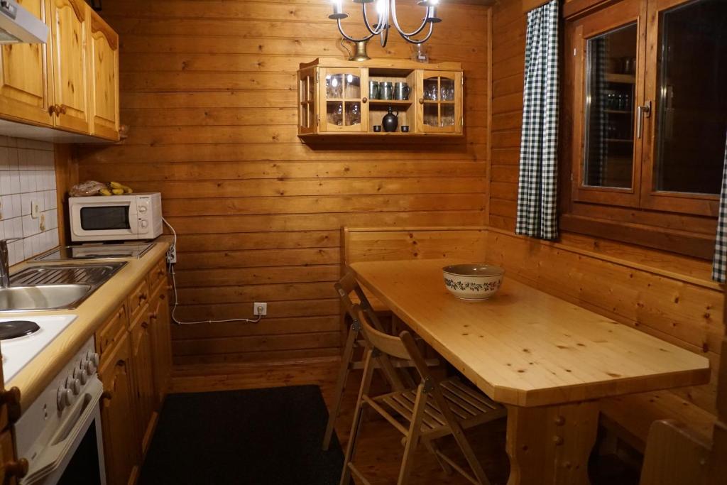 Kuchyň nebo kuchyňský kout v ubytování Gerlitzen-Hütte