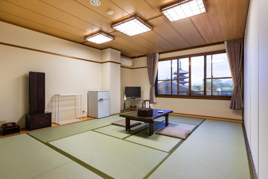 TV a/nebo společenská místnost v ubytování Kyoto Higashiyamaso