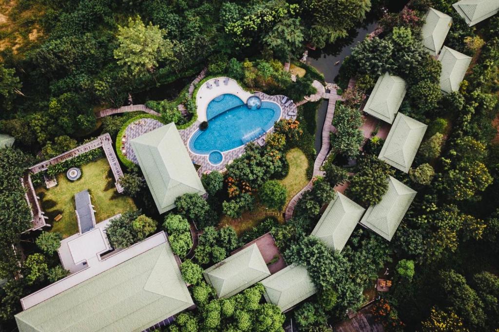 an overhead view of a resort with a swimming pool at Vivace Khaoyai in Mu Si