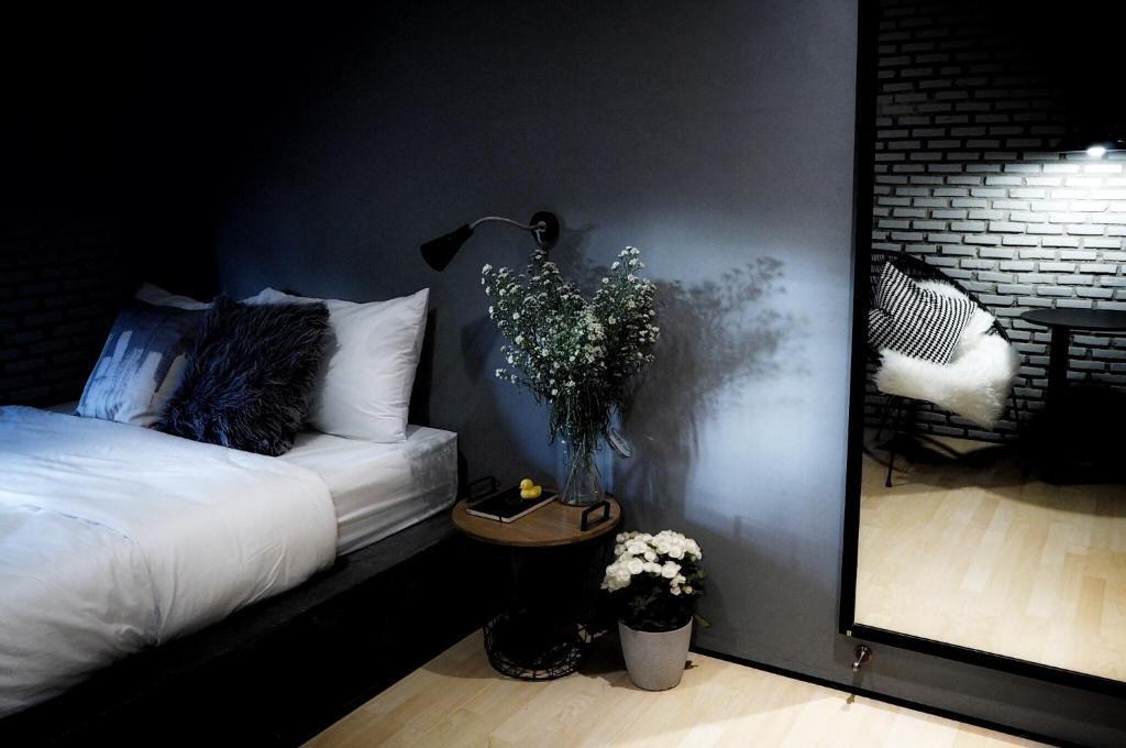 Postel nebo postele na pokoji v ubytování La Malila Hostel