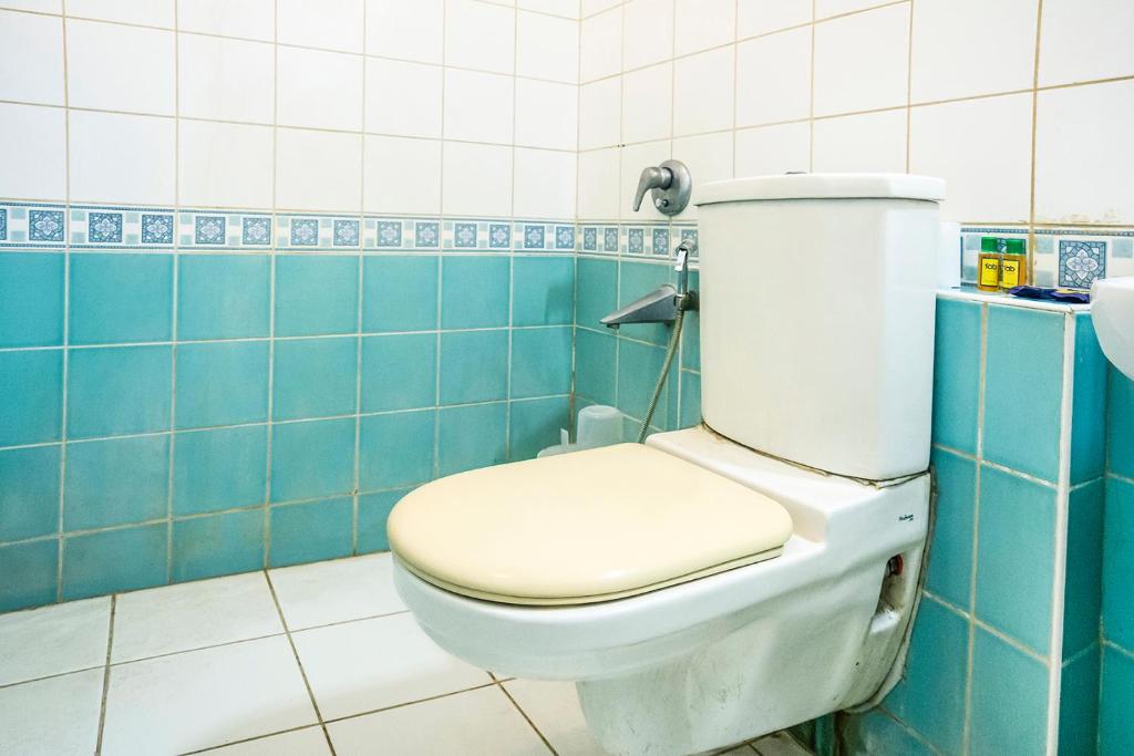 Koupelna v ubytování Fabhotel Blossoms Service Apartment - T Nagar