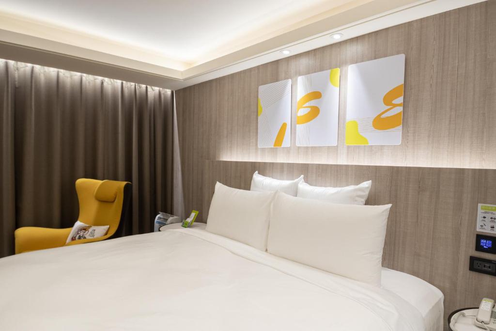 Postel nebo postele na pokoji v ubytování 168 Motel-Zhongli