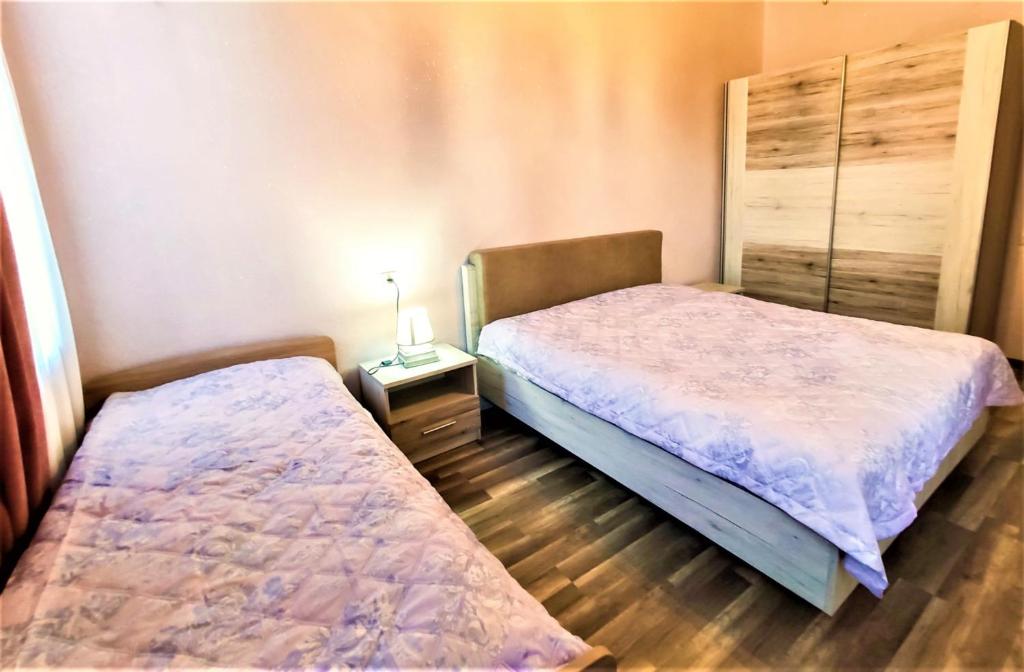 Postel nebo postele na pokoji v ubytování Mango's Guesthouse