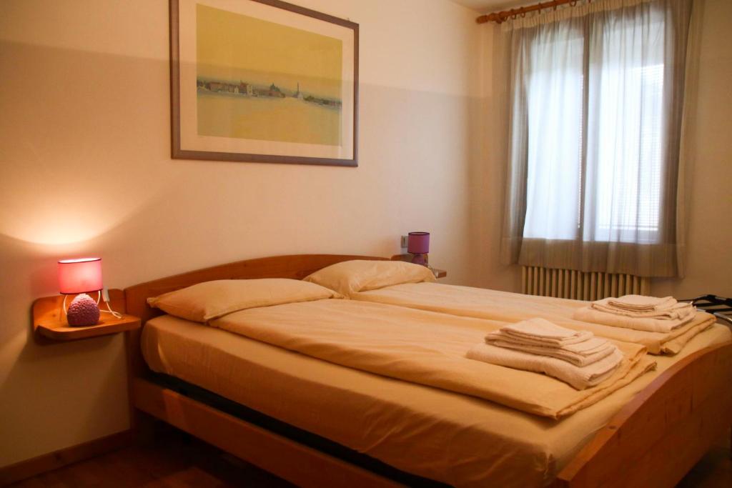 Posteľ alebo postele v izbe v ubytovaní Locanda Aurora B&B