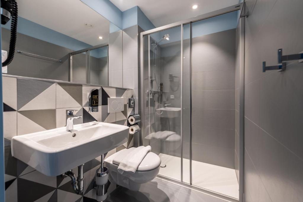 Koupelna v ubytování MEININGER Hotel Innsbruck Zentrum