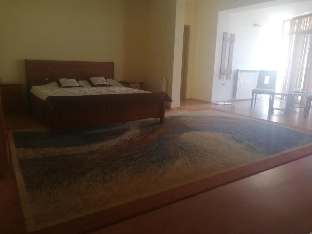 Postel nebo postele na pokoji v ubytování Pensiunea Casa Benko