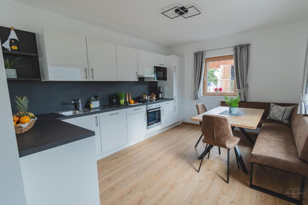 Kuchyň nebo kuchyňský kout v ubytování Apartment Edith
