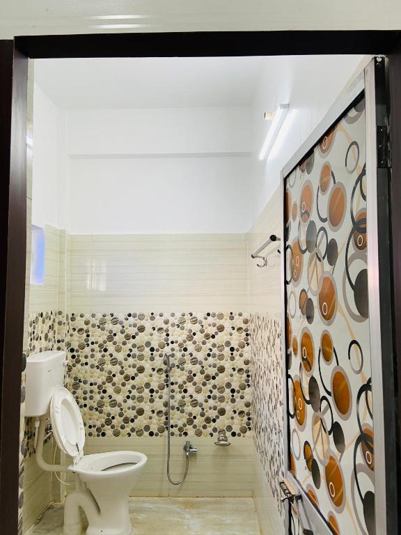 Koupelna v ubytování Hotel Nishi