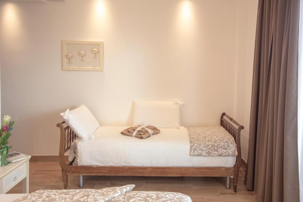 Postel nebo postele na pokoji v ubytování Hotel Flora