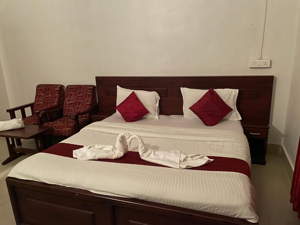 Postel nebo postele na pokoji v ubytování Hotel Caveri