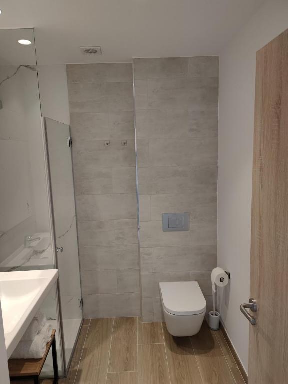 Kúpeľňa v ubytovaní Apartamentos A pousa do Asma