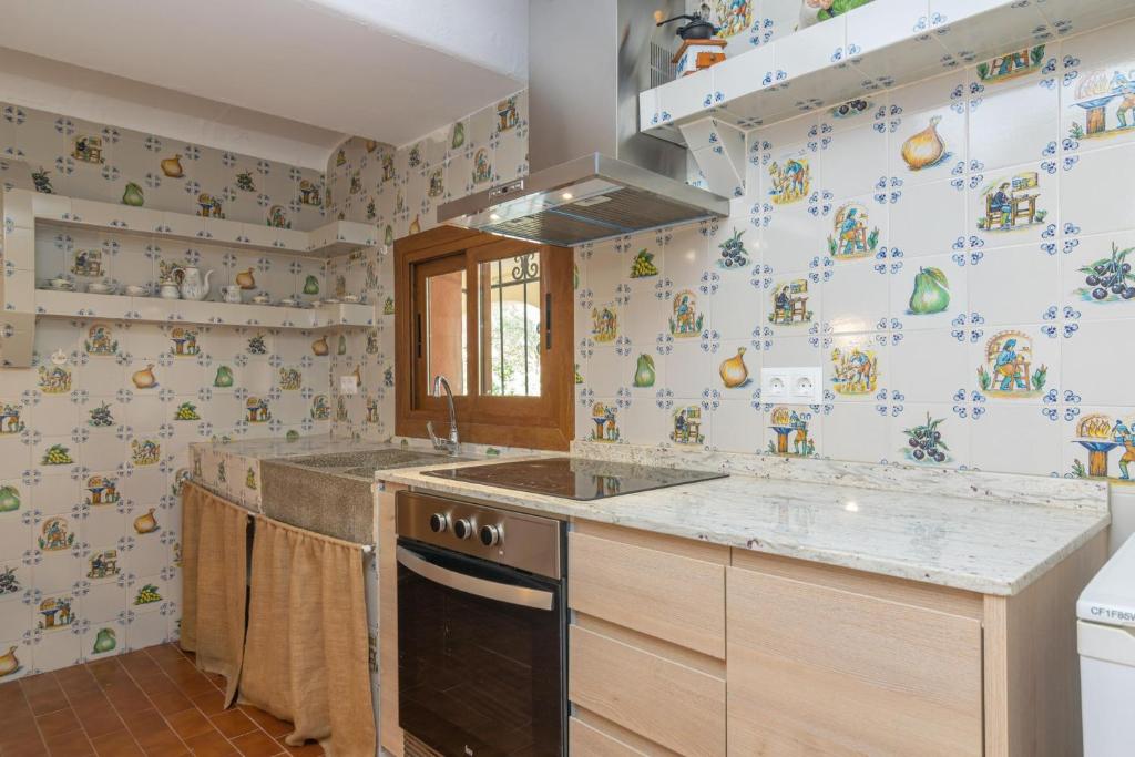 Kuchyň nebo kuchyňský kout v ubytování Villa Maria 6