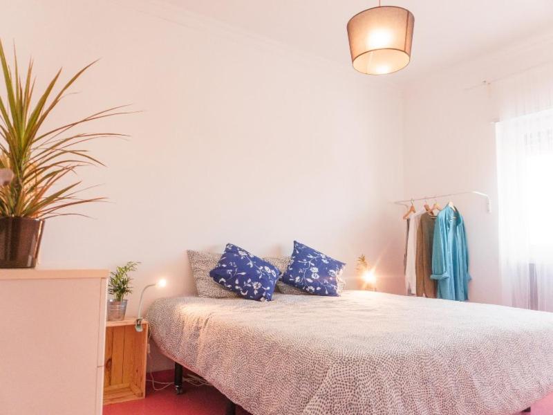 Llit o llits en una habitació de Hospedium Hostel República Surf House