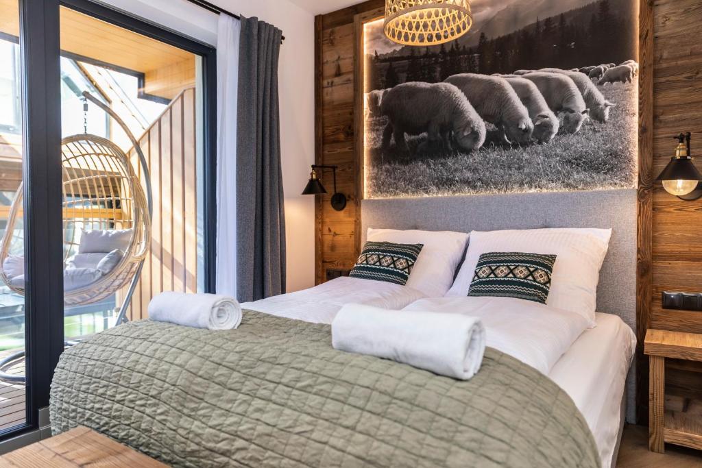 Posteľ alebo postele v izbe v ubytovaní udanypobyt Apartament Modrzejewska 16
