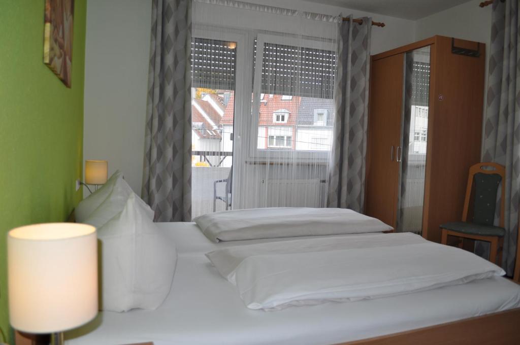 Postel nebo postele na pokoji v ubytování Hotel Discovery