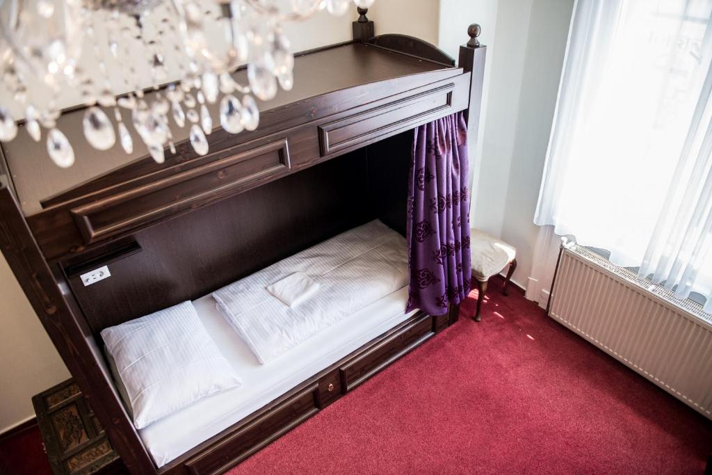 Postel nebo postele na pokoji v ubytování Vienna Boutique - Premium Hostel