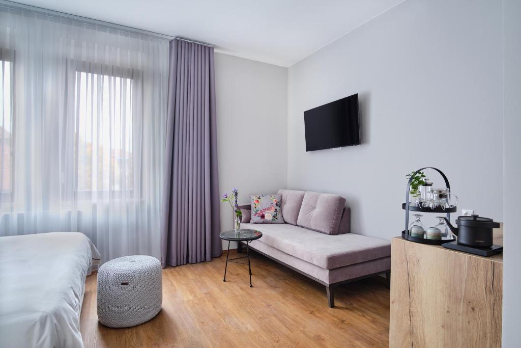 Posezení v ubytování The Kepos Hotel Erlangen