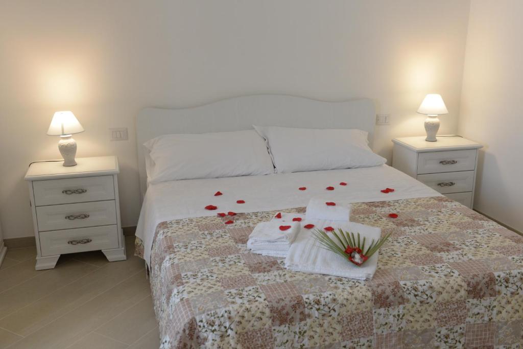A bed or beds in a room at Domus Antiqua Residence