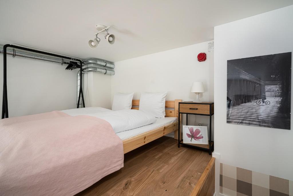Posteľ alebo postele v izbe v ubytovaní RentPlanet - Apartamenty Zarembowicza